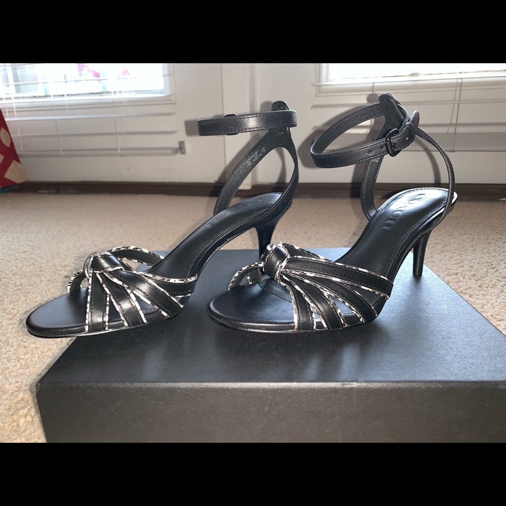 Women’s Black and White Coach heel with strap